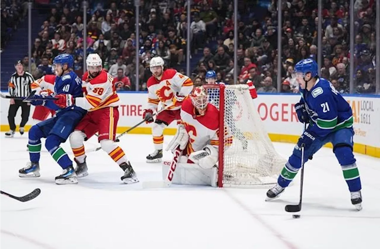 Hoglander scores twice as Vancouver Canucks double up Calgary Flames 4-2