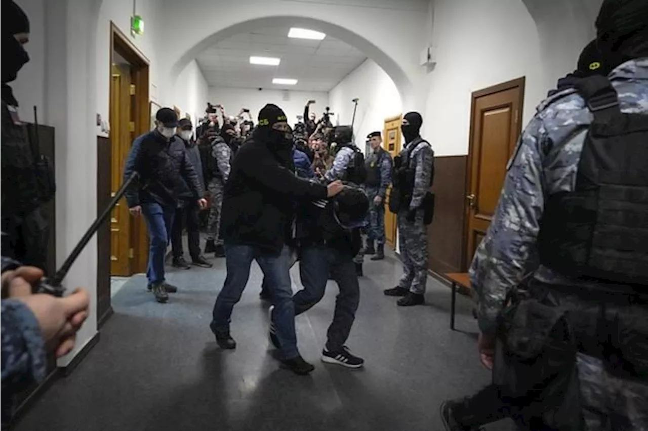 Russia concert hall attack suspects appear in a Moscow courtroom