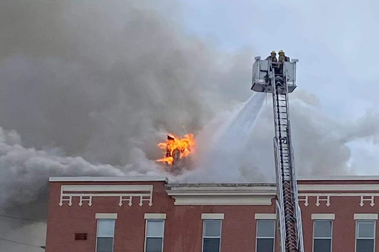 'Devastating' fire rips through historic building in Timmins