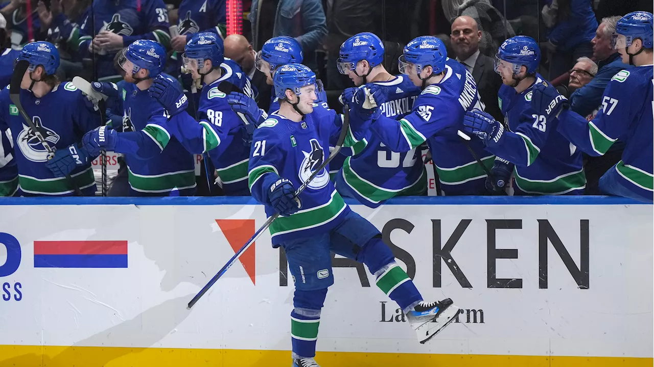 Hoglander scores twice as Canucks double up Flames