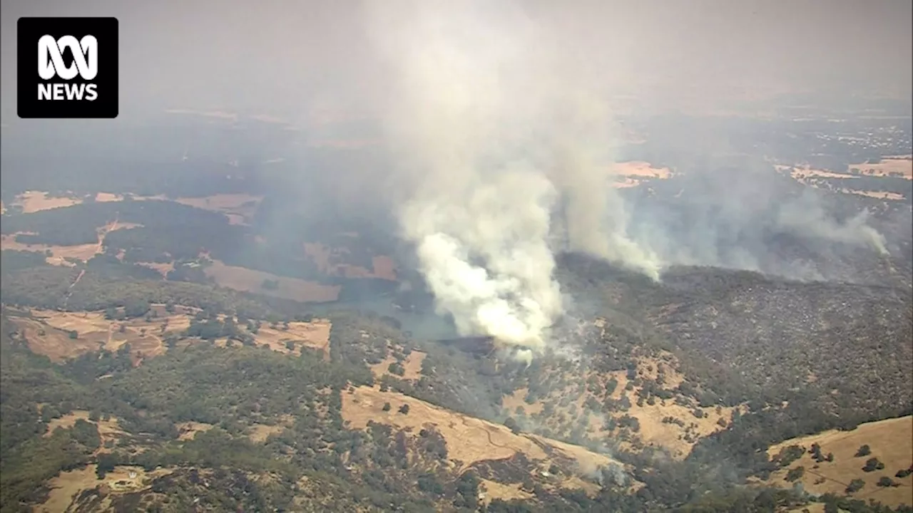 Bushfire emergency downgraded but Waroona blaze continues south of Perth for fourth day