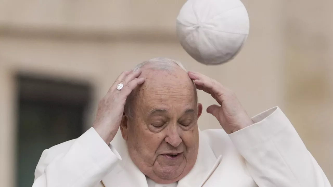 One Extraordinary Photo: Pope Francis' cap flying off his head