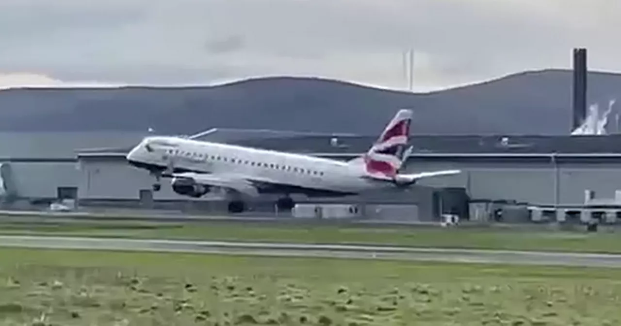 Watch as two planes abort landings at Belfast airport