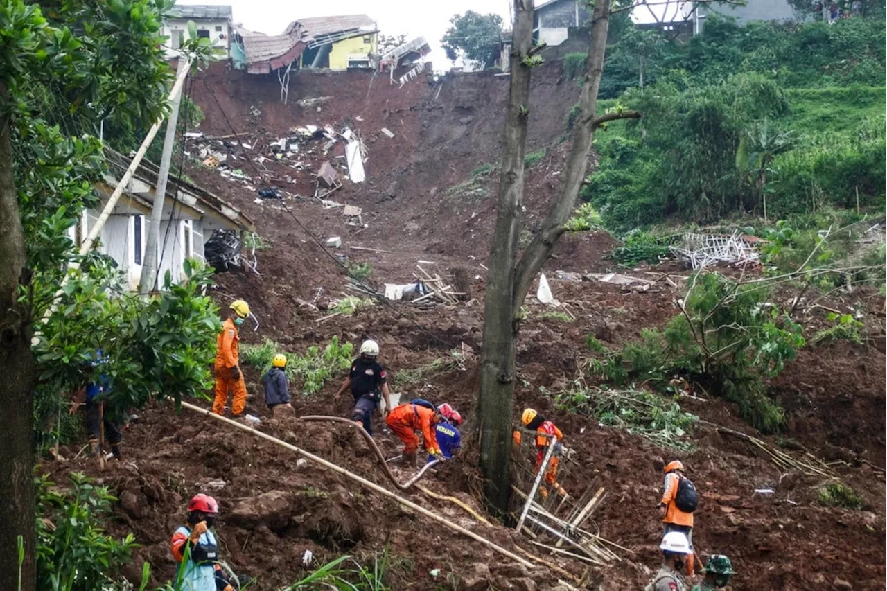 9 missing after landslide, flood in Indonesia