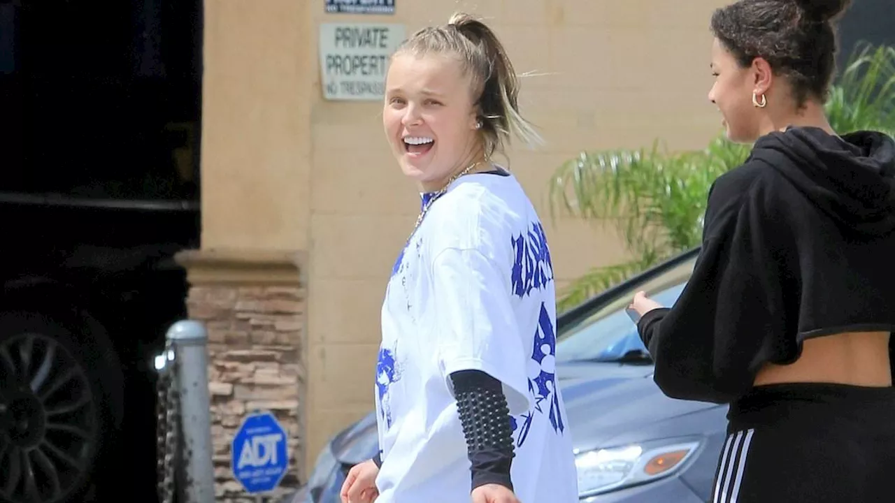 JoJo Siwa steps out with a friend in LA after shedding child-friendly image and releasing explicit...