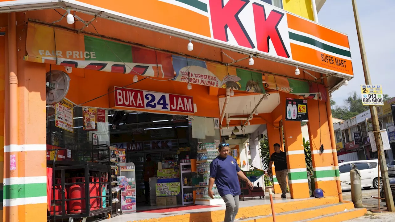 Malaysian convenience store owners charged over 'Allah' socks that angered Muslims