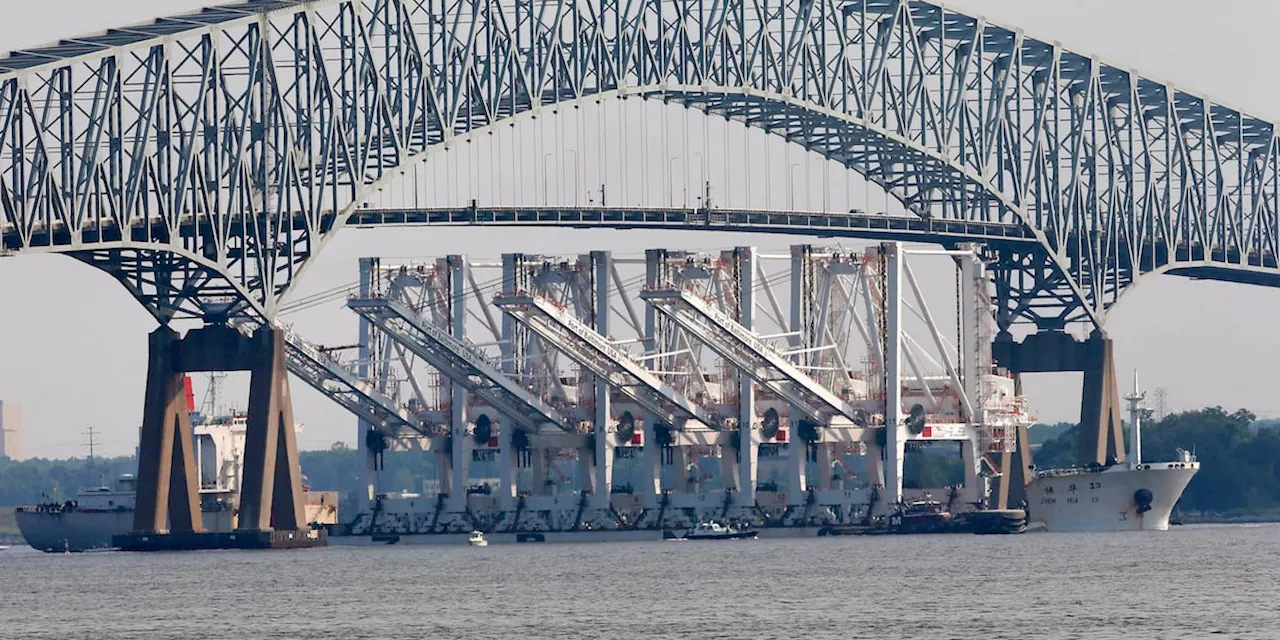 Baltimore’s Key Bridge collapses after ship strikes it, sending vehicles into water