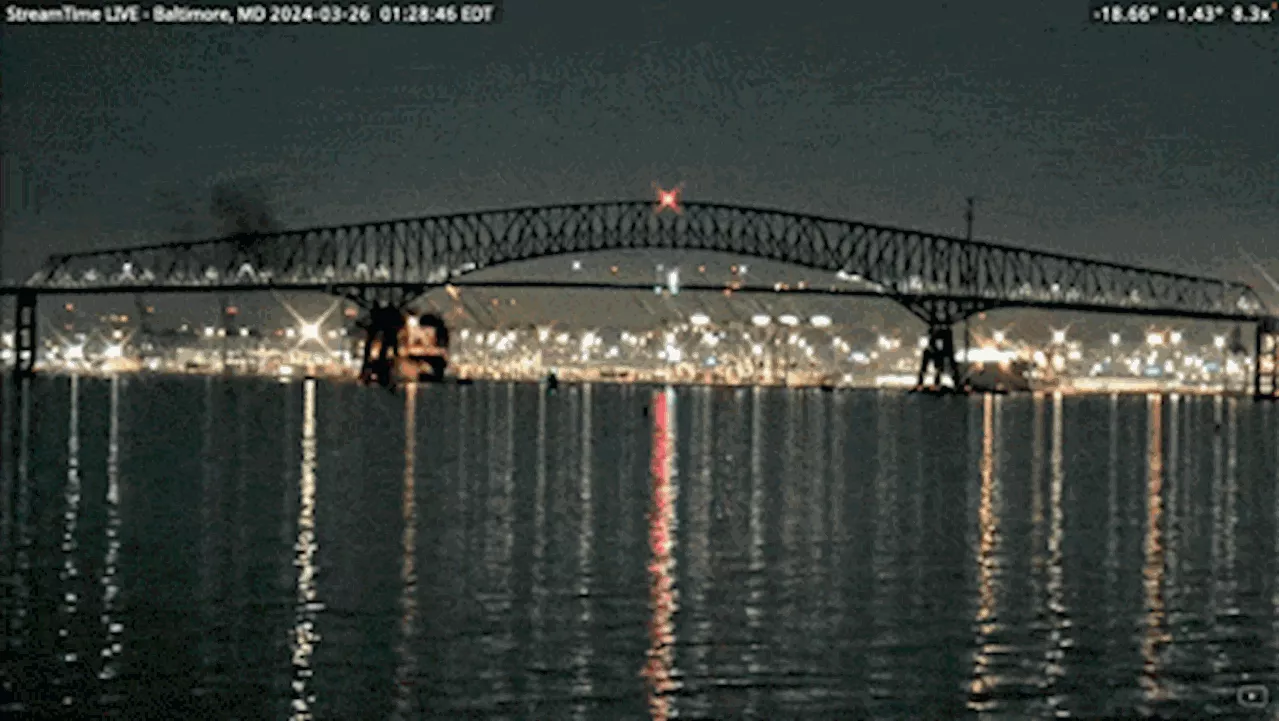 Watch moment 9000ft Baltimore bridge collapses after ship crash