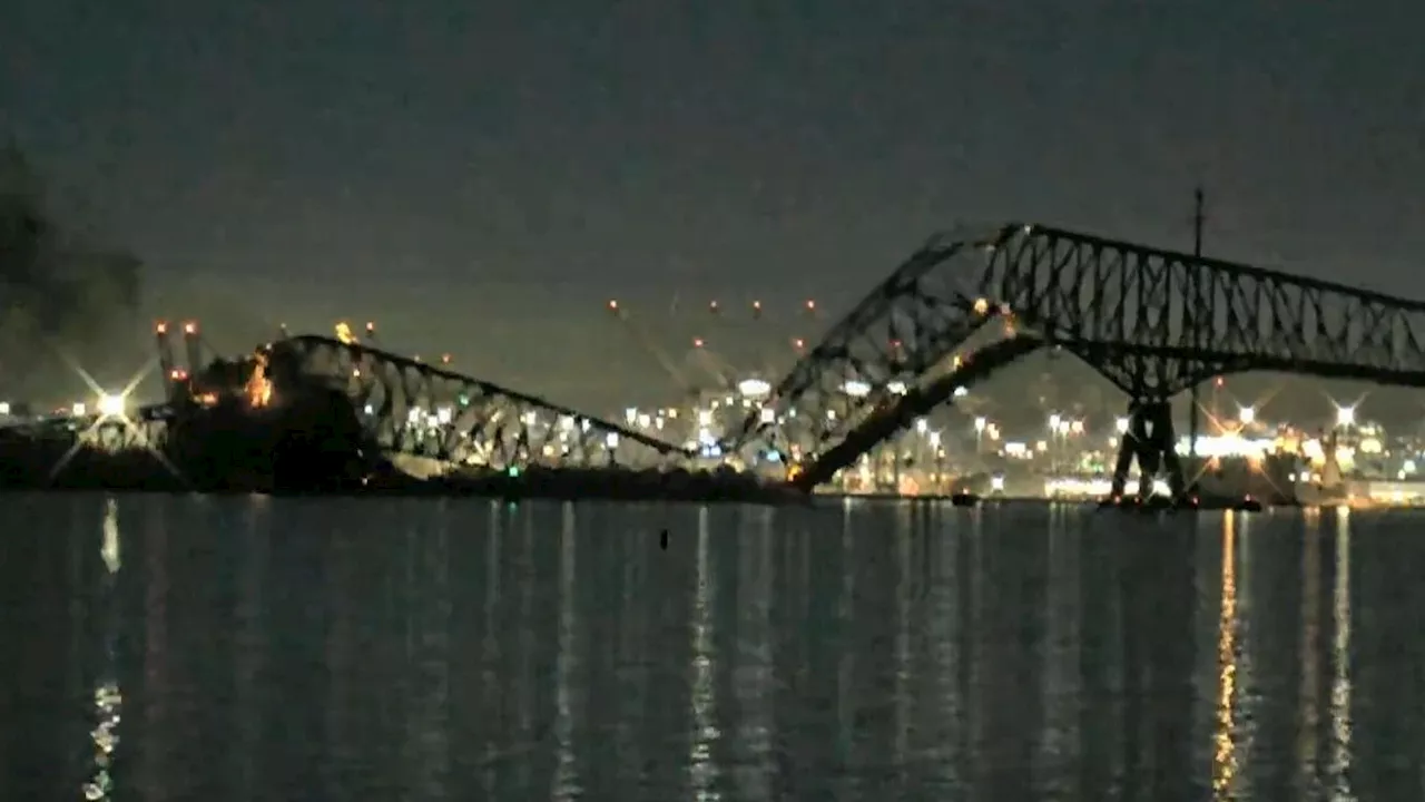 Vehicles fall into water as bridge collapses after being hit by ship in Baltimore