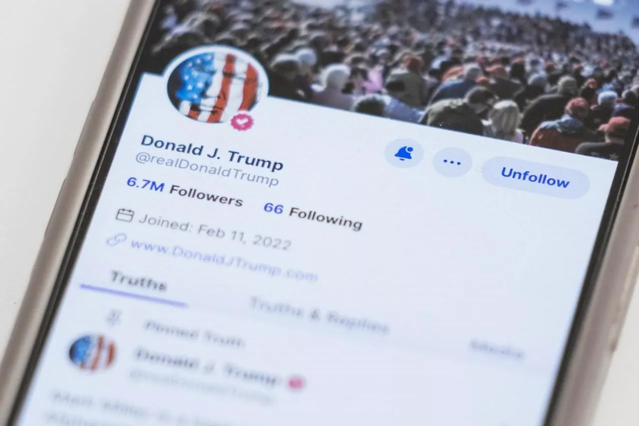 Trump's social media company soars 40% in its first day of trading on Nasdaq