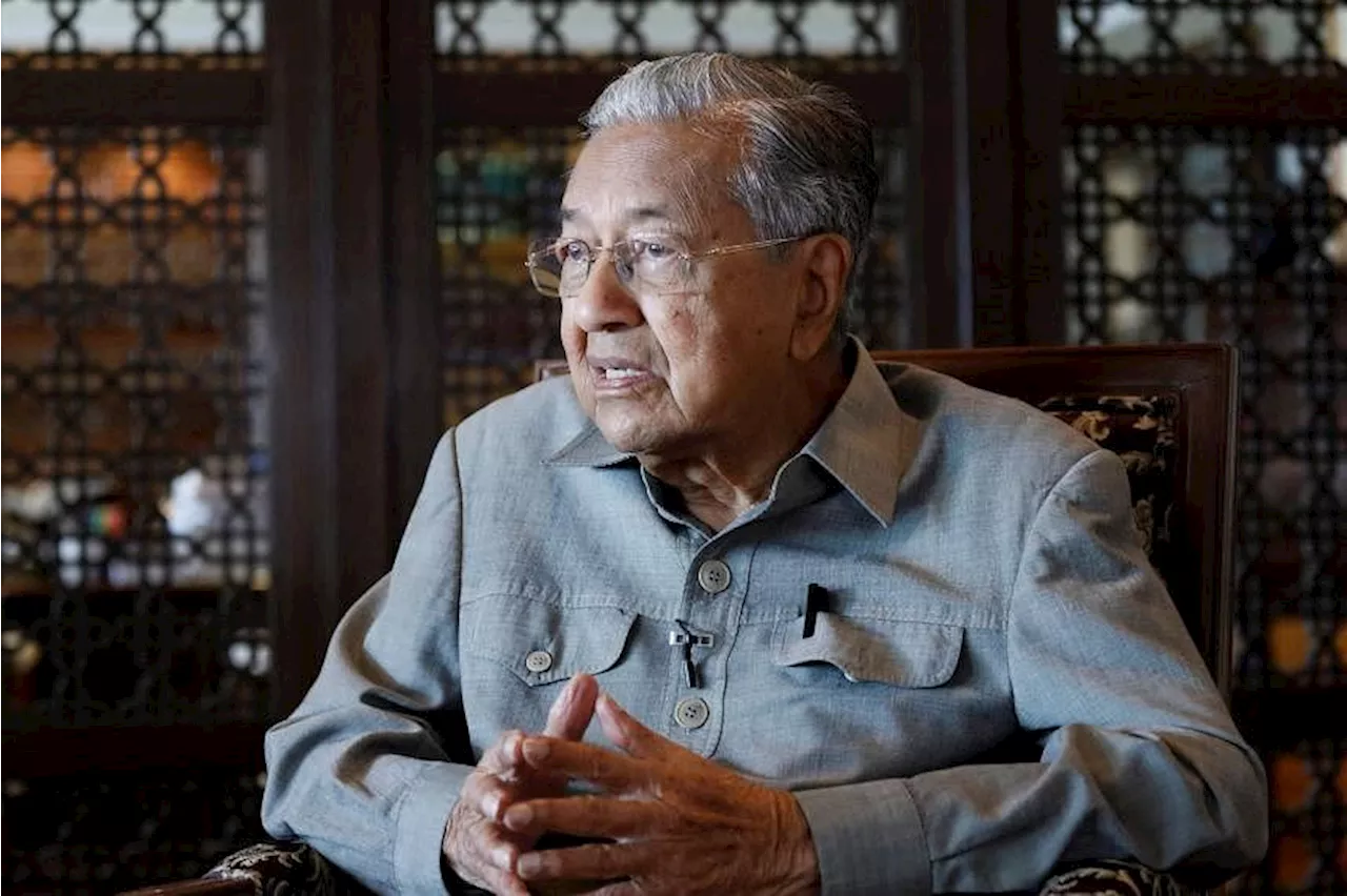 Mahathir sons say 98-year-old father is target of Malaysia probe