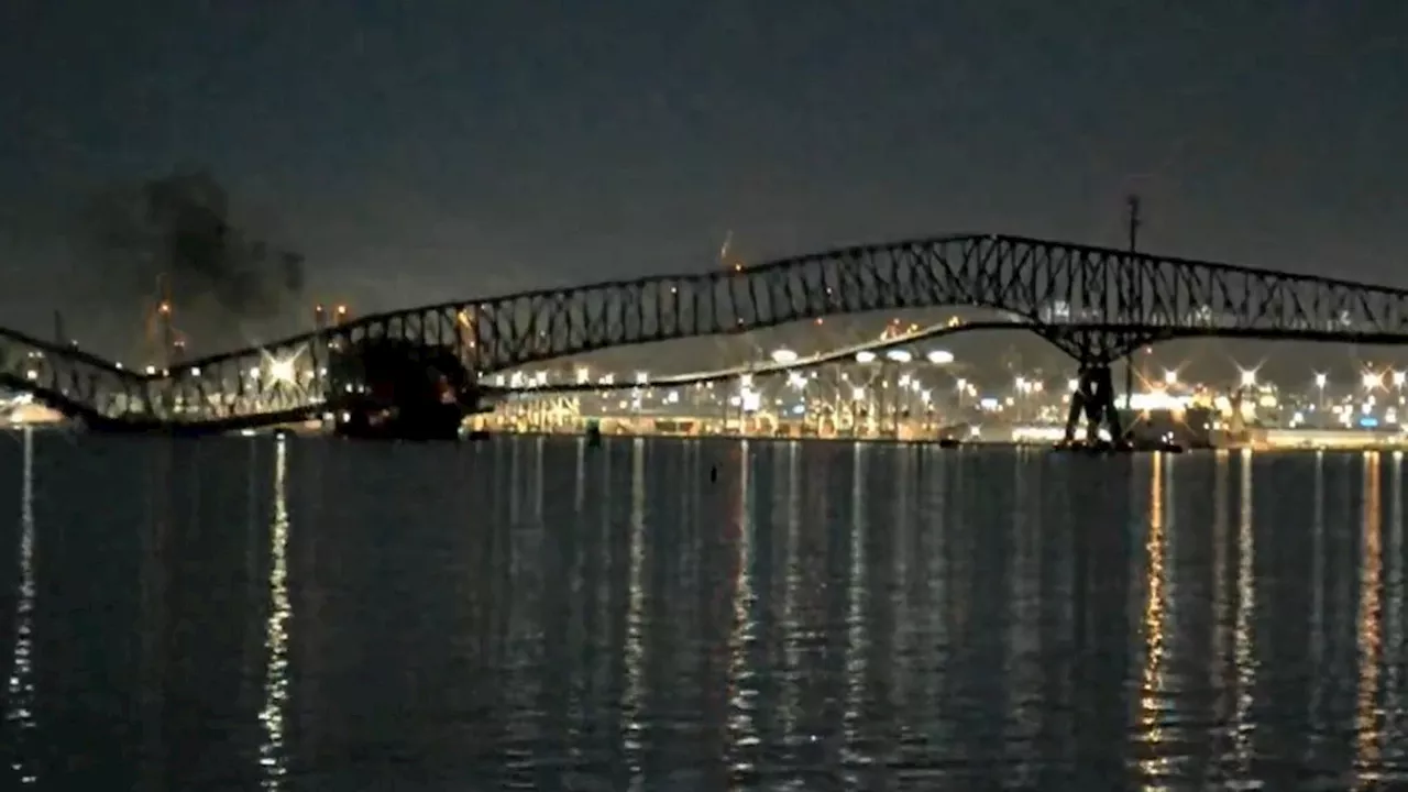 Baltimore bridge collapses leaving people and cars in water after ship collision