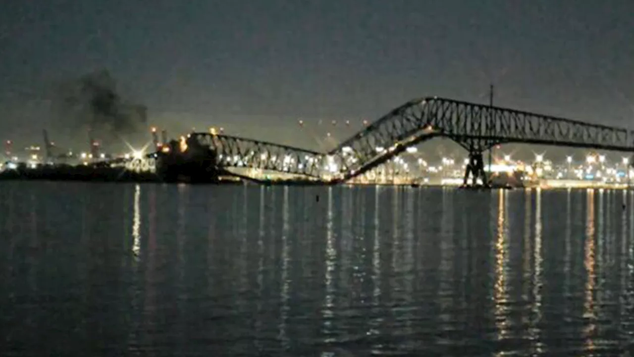 Horrifying moment Maryland’s Francis Scott Key Bridge collapses after being hit by ship sparking mass c...