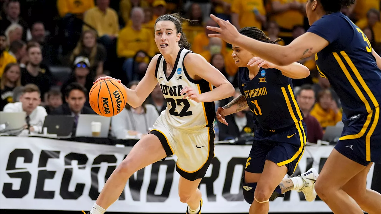 Clark scores 32 as top seed Iowa survives to top West Virginia