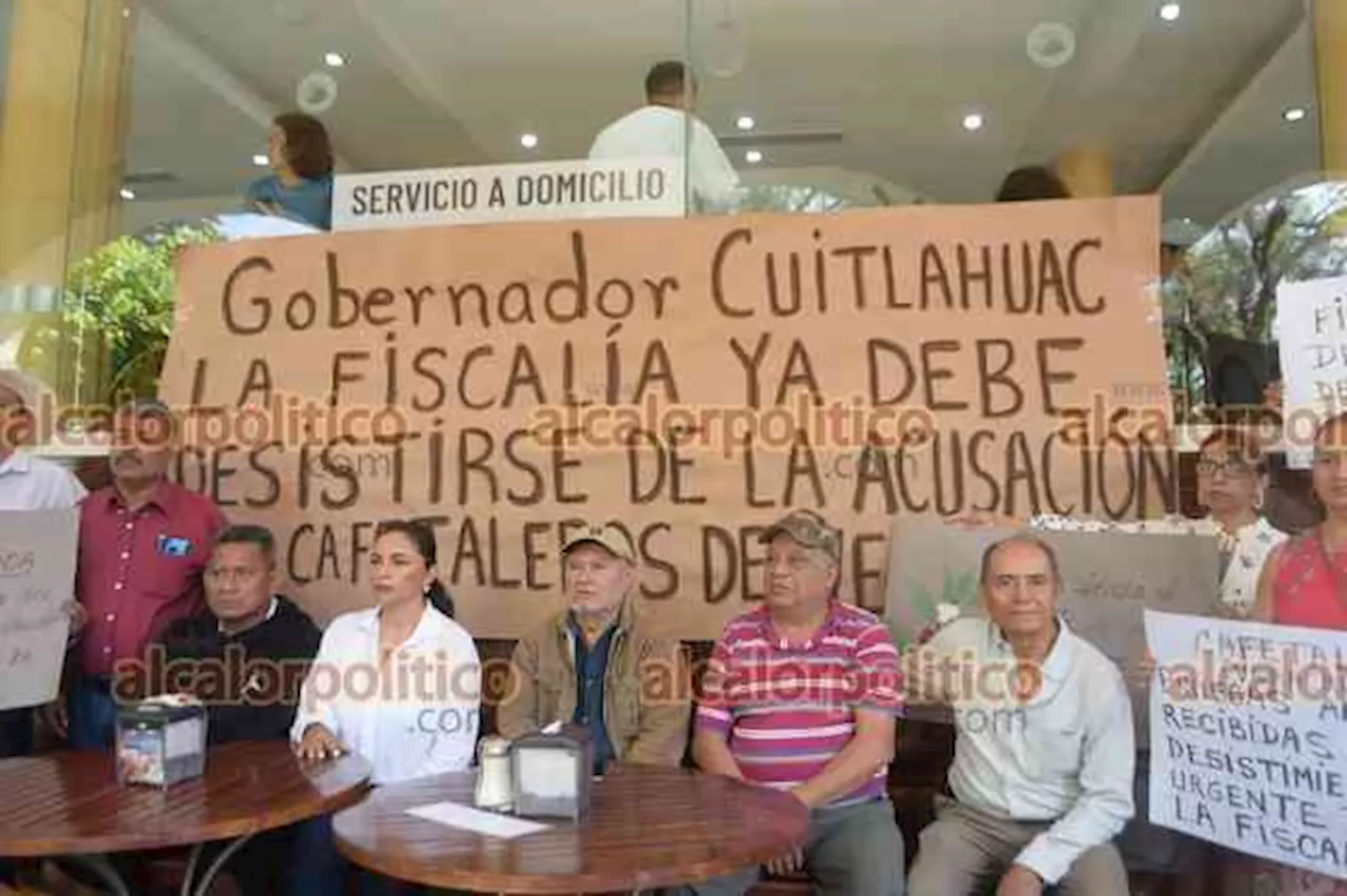 Exalcaldesa y cafetaleros de Ixhuatlán exigen cerrar caso en su contra