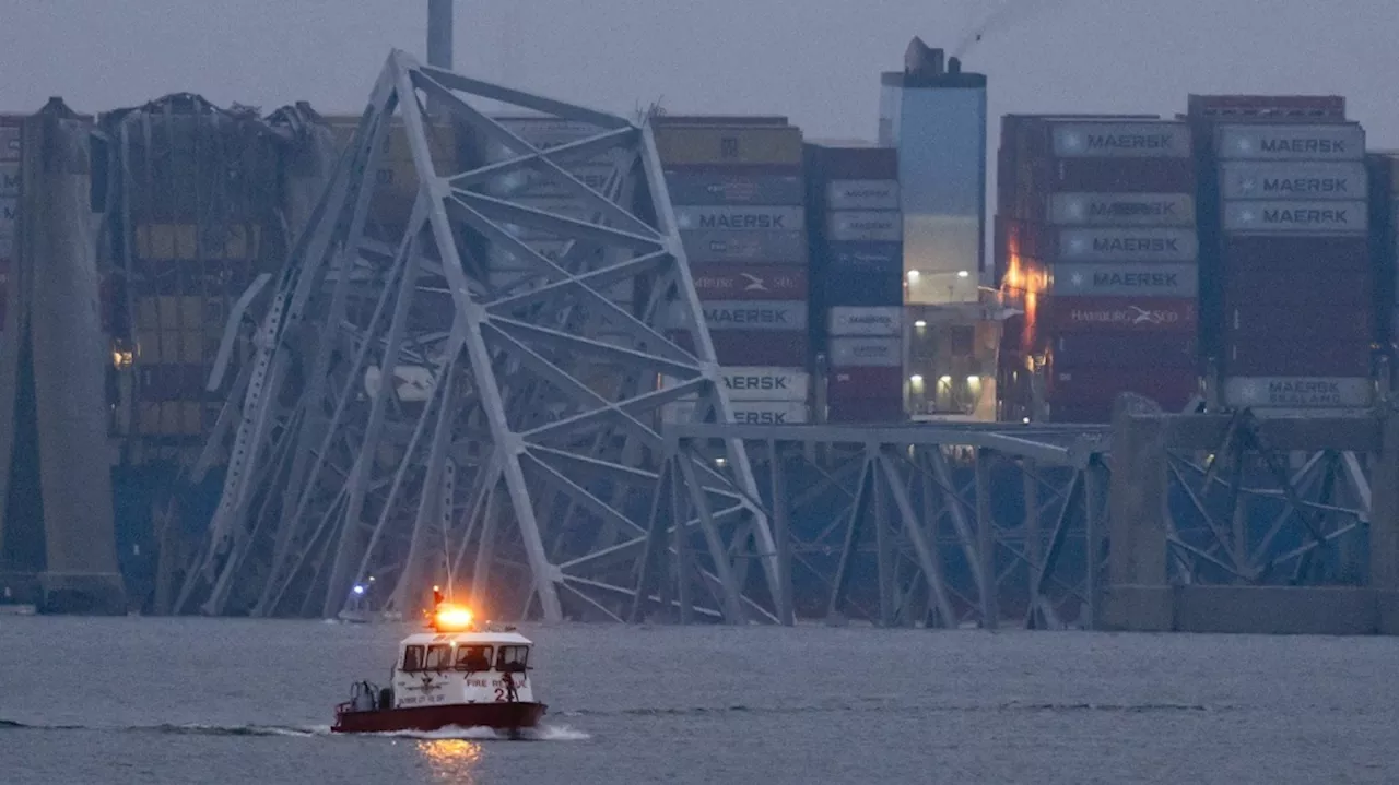 Investigation into Baltimore bridge collapse picks up speed as divers search for missing workers