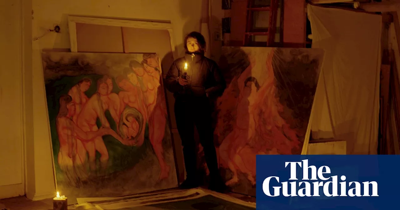 Amid air raids and electricity shortages, a Ukrainian artist paints the Russian invasion