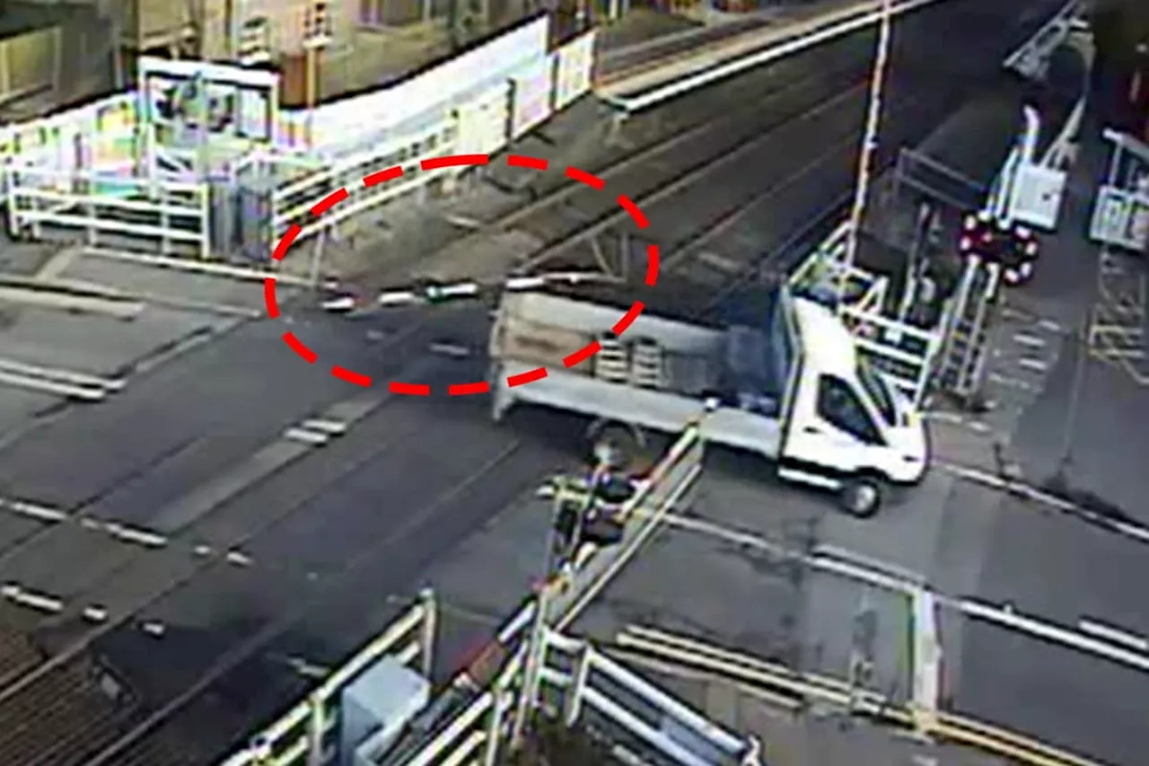 Level crossing smash: CCTV shows reckless van driver ploughing through Network Rail barrier