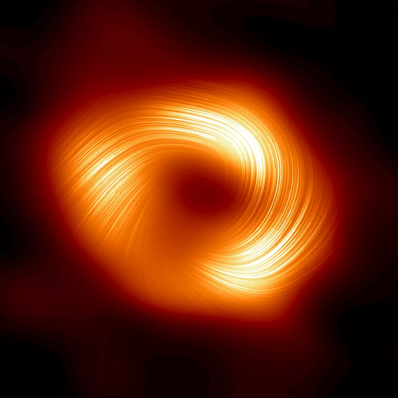 Astronomers unveil strong magnetic fields spiraling at the edge of Milky Way's central black hole