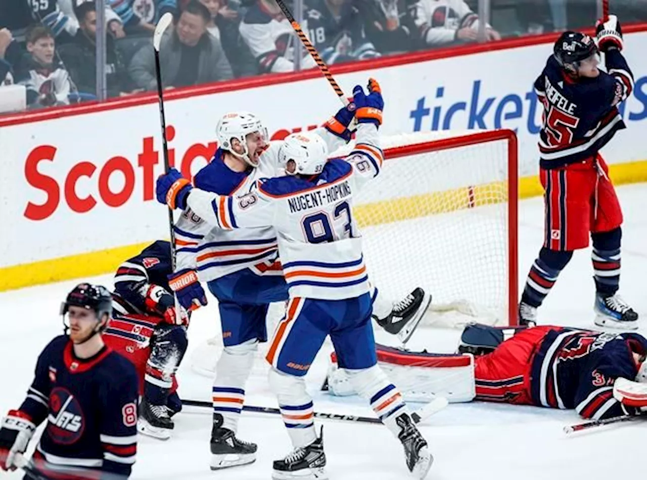 Hyman plays OT hero as Oilers edge Jets 4-3