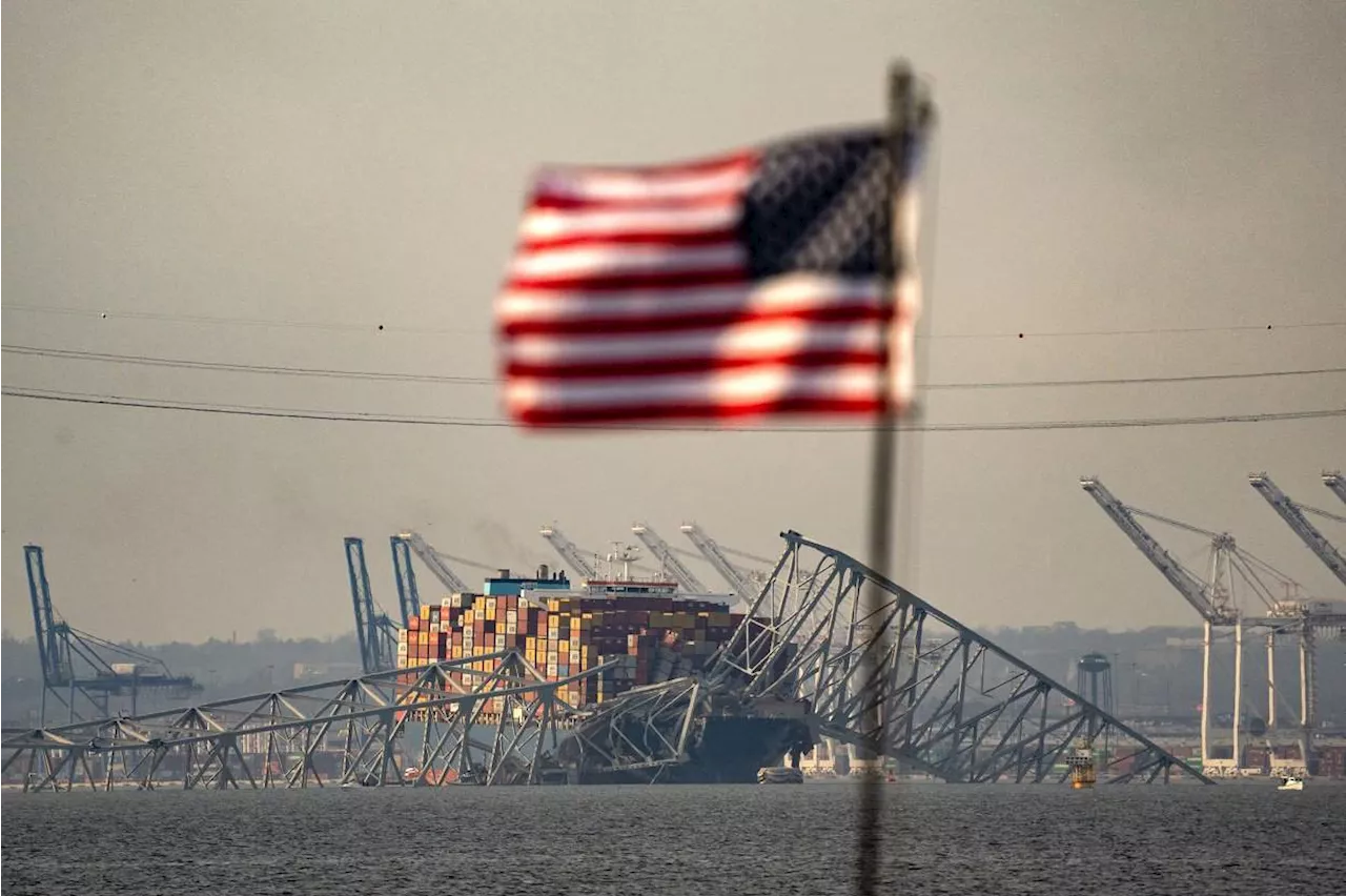 Baltimore bridge response shifts to recovery of six missing