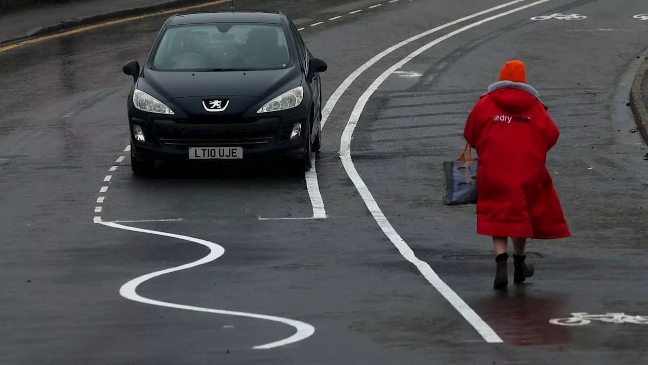 Britain's 'most bonkers' road markings will finally be scrapped: Council votes to remove wiggly...