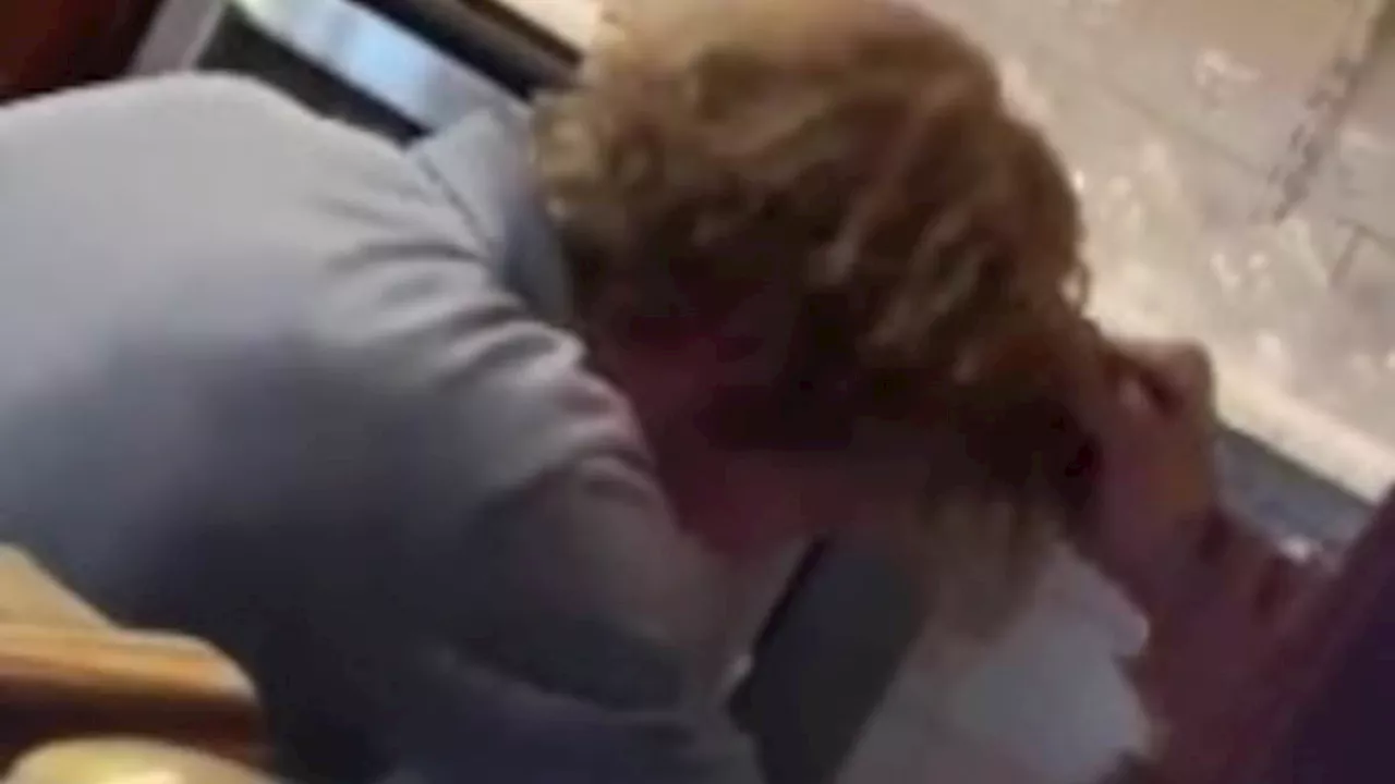 Shocking moment violent thug asks young barman to shake his hand - then grabs the lad by his hair...