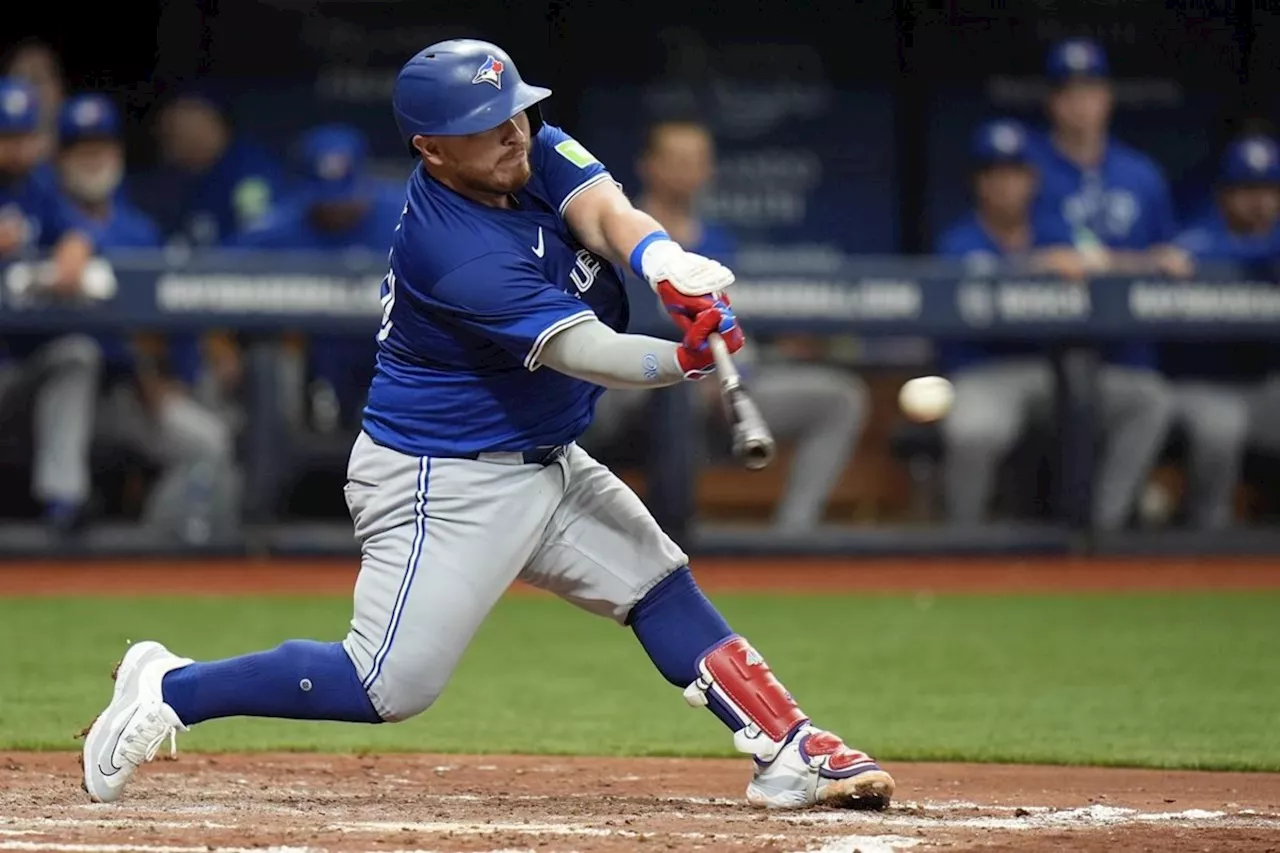 Jays play long ball to open season with 8-2 win over Rays