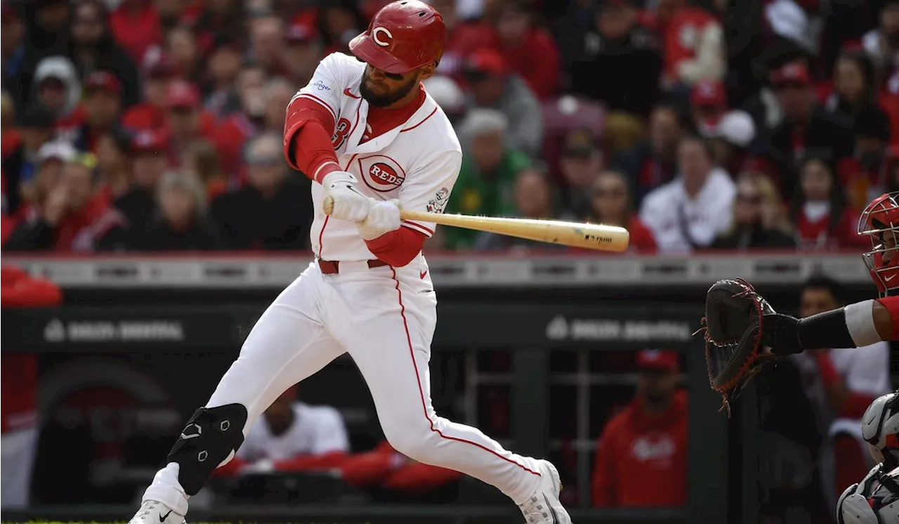 Nick Martini homers twice, Frankie Montas shines and Reds beat Nationals 8-2 in opener