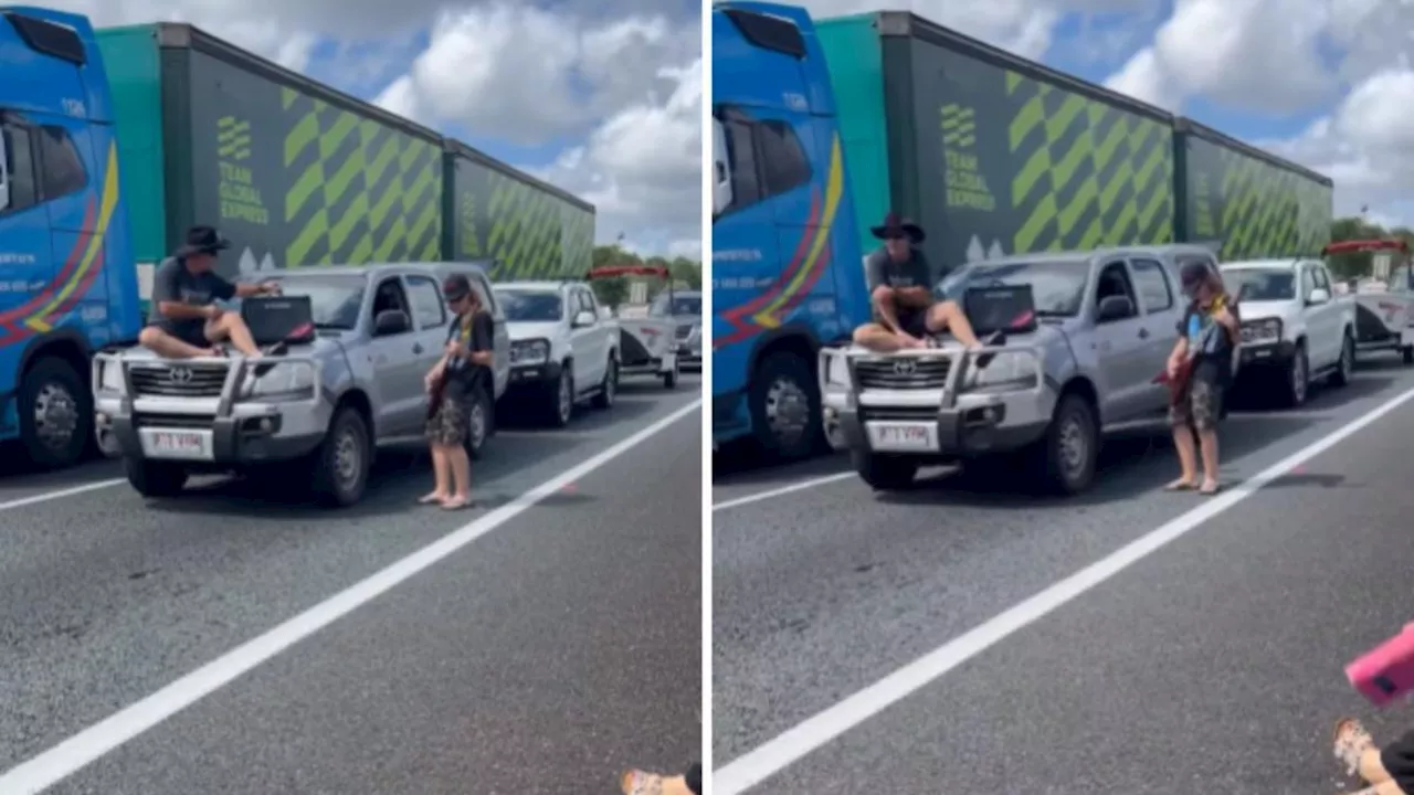 Man plays Metallica’s Master of Puppets on guitar in Easter holiday traffic chaos on Queensland’s Bruce Highway at Maroochydore