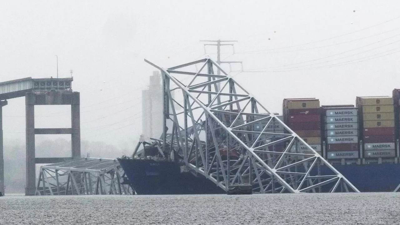 Cranes arriving to start removing wreckage from deadly Baltimore bridge collapse