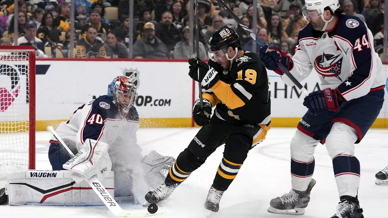 Malkin reaches 20 goals for the 15th time as Penguins edge Columbus 3-2