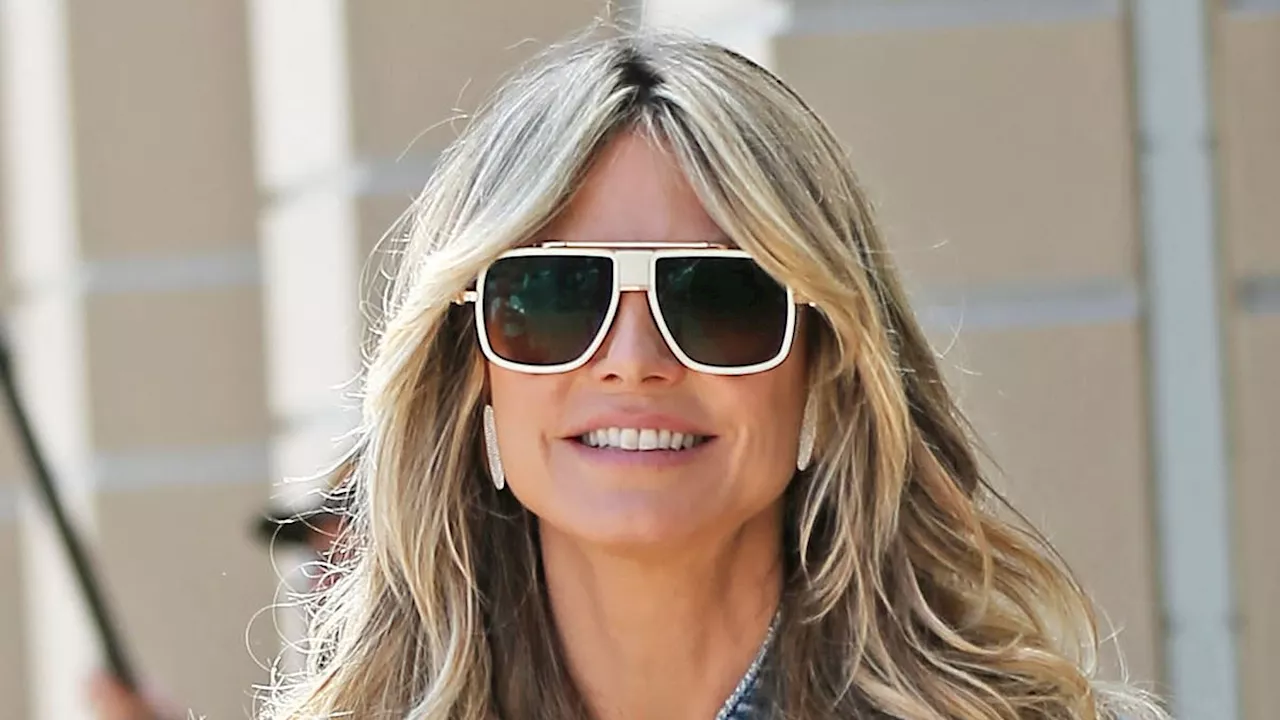 Heidi Klum shows off her spring style in a denim vest and leather pants while Sofia Vergara cradles...