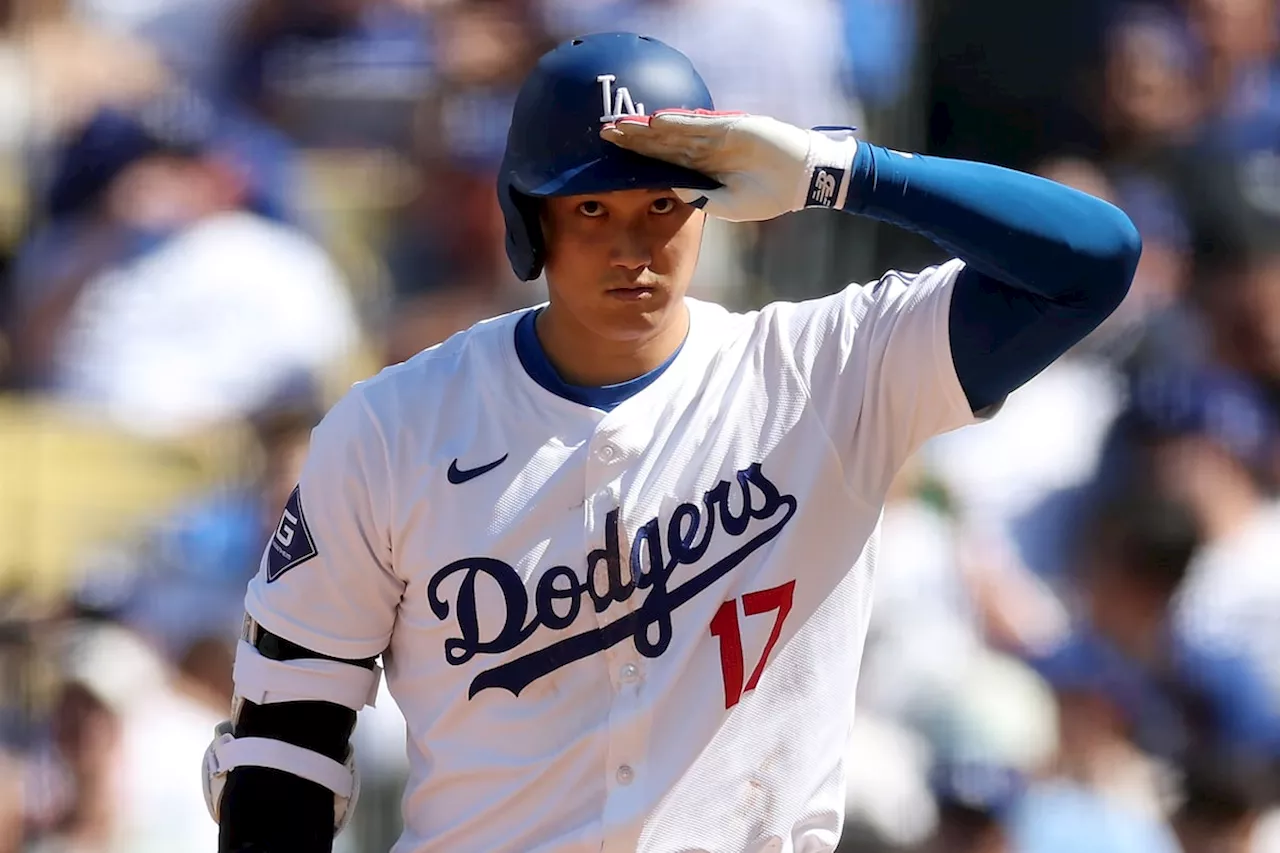 Ohtani reaches three times in home debut as the Dodgers rout the Cardinals