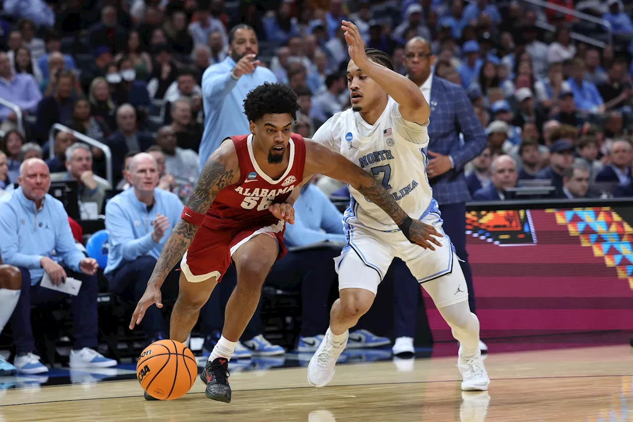 March Madness live updates: UNC battling Alabama; Illinois leads Iowa State