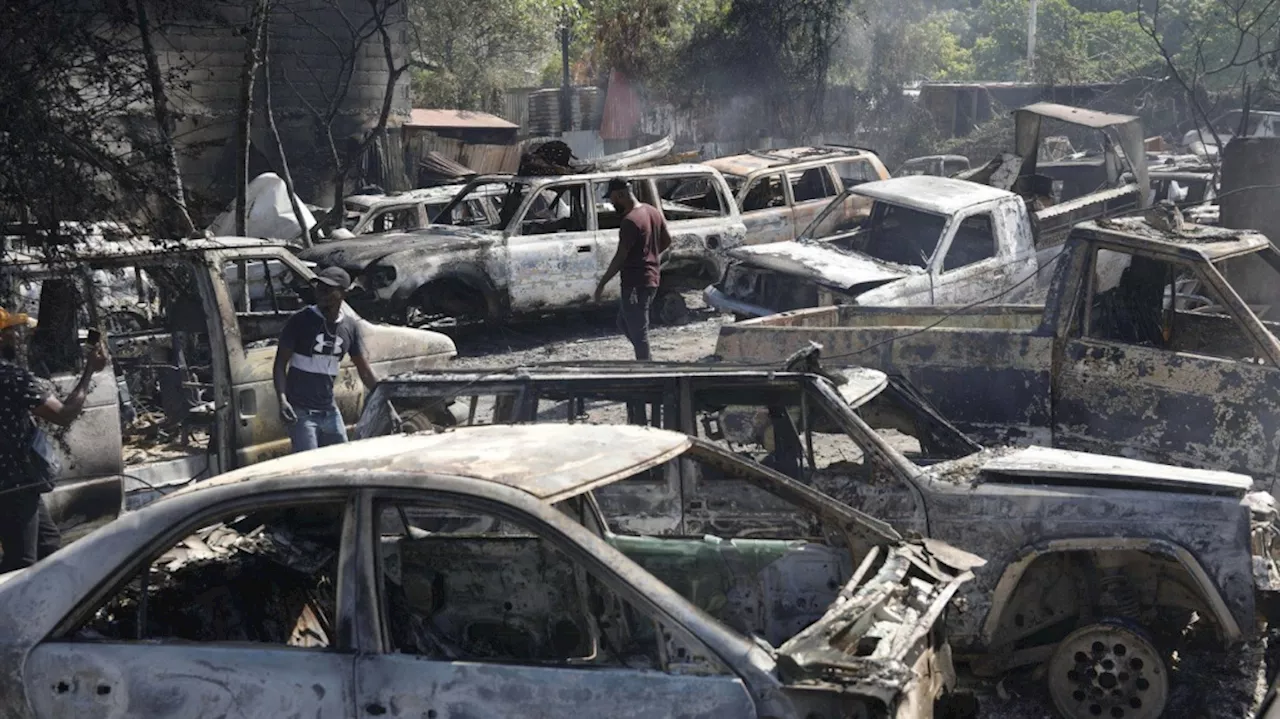 Police in Haiti say two men were hacked to death by a mob who thought they were buying ammo for gangs