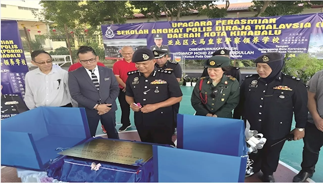 Cops adopt Kota Kinabalu High School