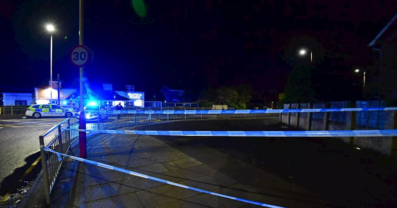 Huge cordon spans entire road as police surround scene