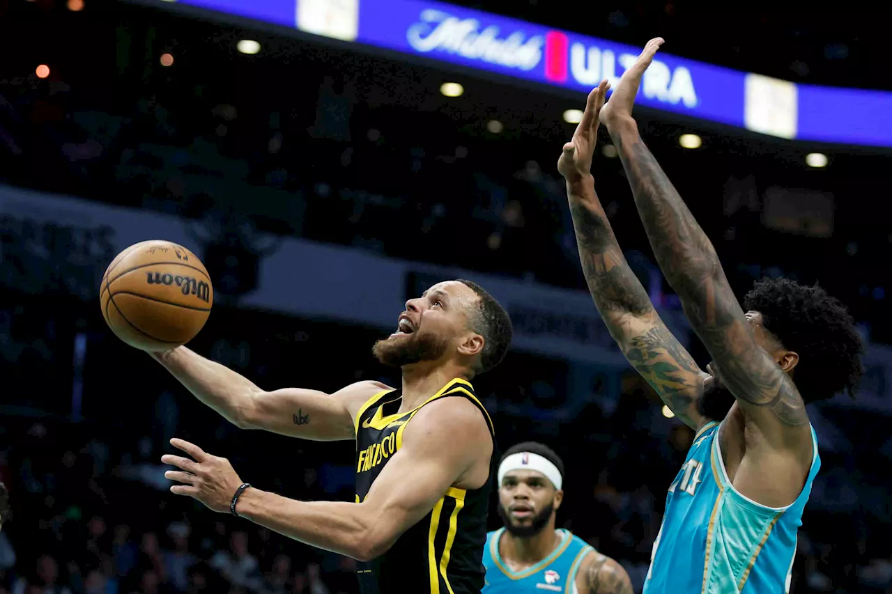 NBA: Curry, Warriors overwhelm Hornets