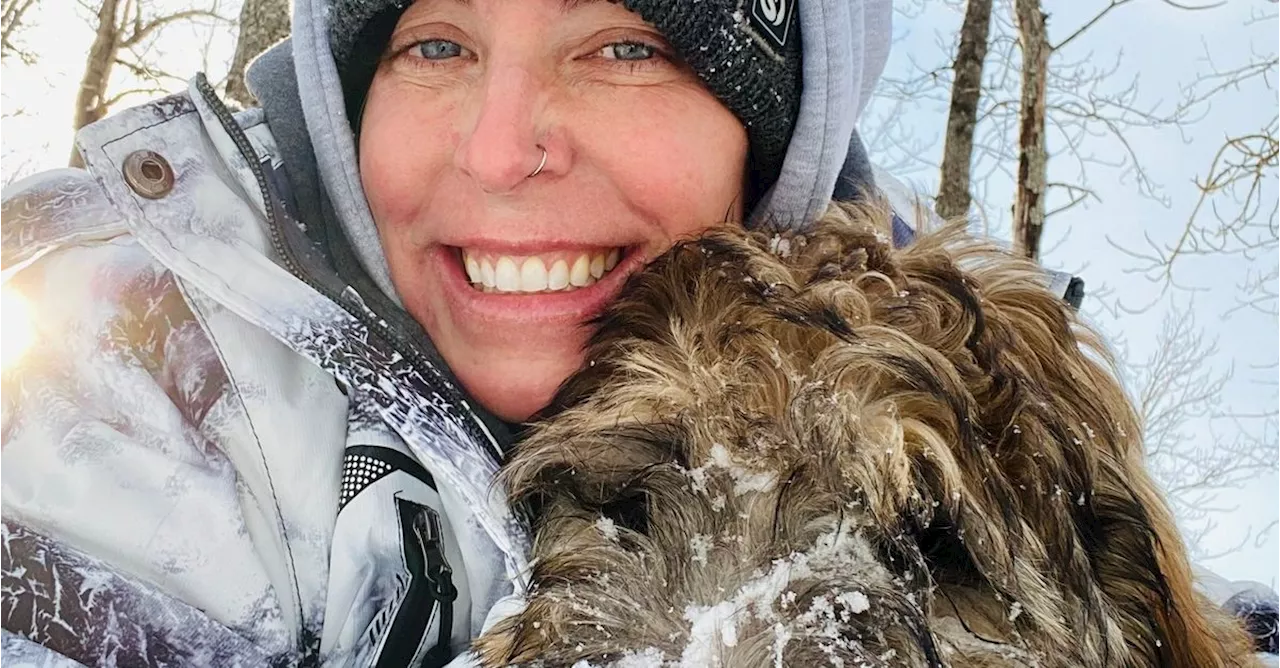 Woman Who Died Trying To Save Dog From Icy River Found With Pet's Body In Arms: Family