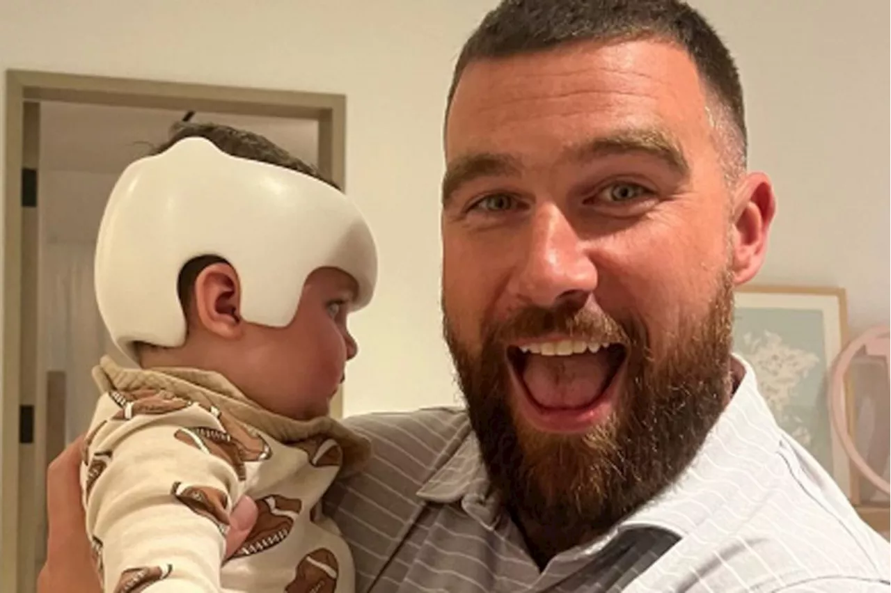 Travis Kelce Adorably Cheeses with His Friend Chandler Parsons' Baby — and Signs Boy's Cranial Helmet!