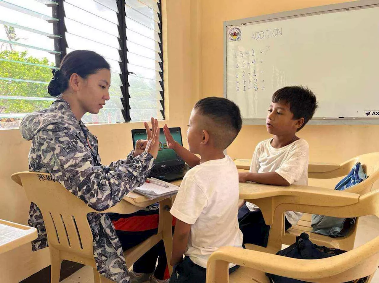 IN PHOTOS: Coast Guard brings doctors, nurses, teachers to Pag-asa Island