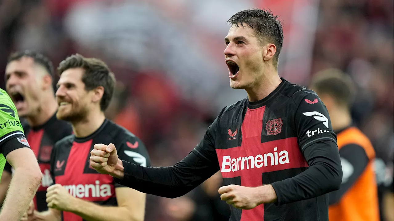 Leverkusen scores twice late to avoid first defeat of the season