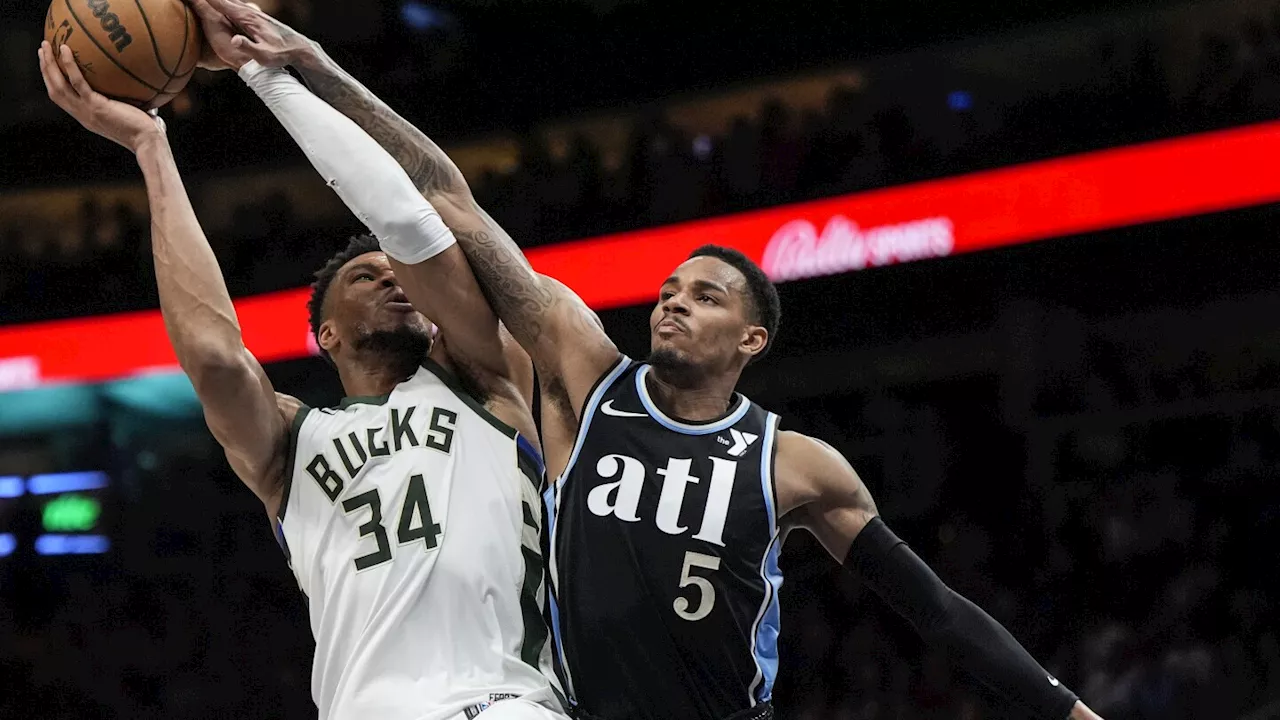 Giannis Antetokounmpo has 36 points, 16 rebounds to power Bucks past Hawks, 122-113