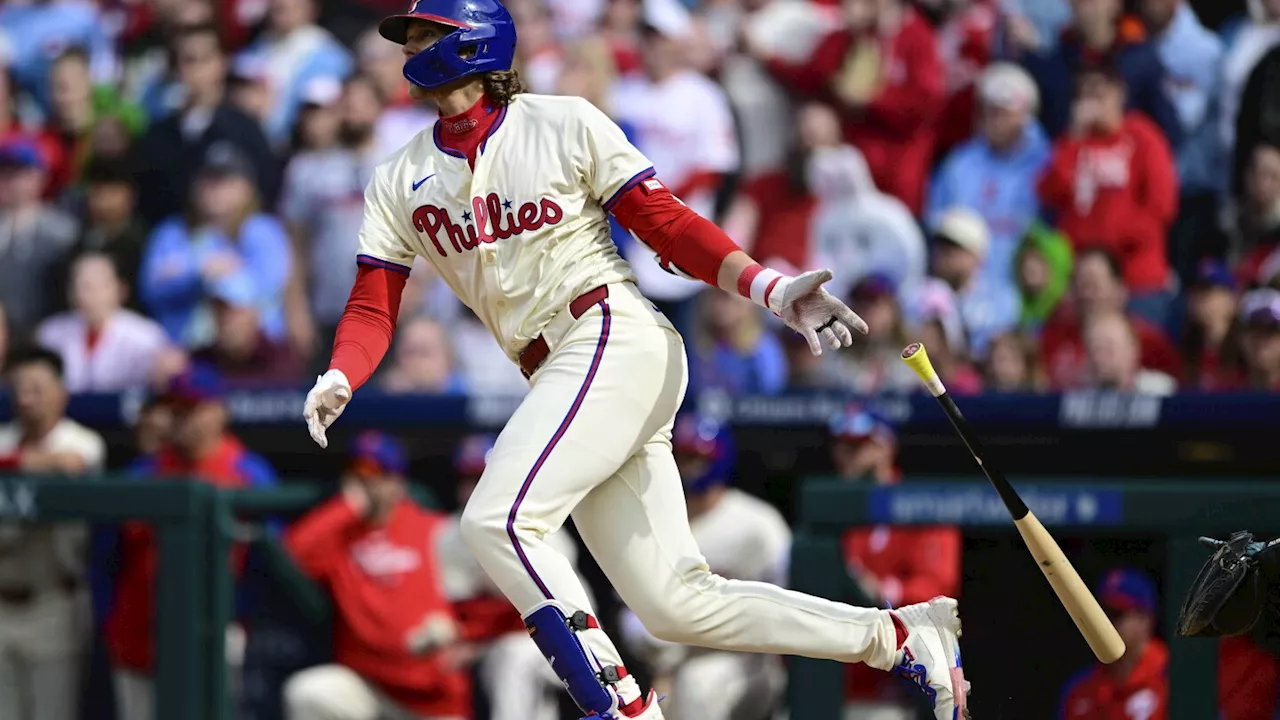 Overturned third out on replay leads to a 5-4 Phillies win over Braves