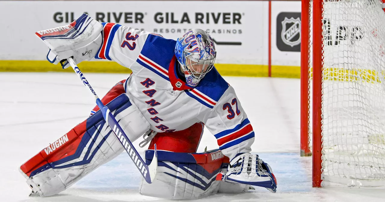 NHL-leading Rangers get 50th win, Quick sets US record in victory over Coyotes