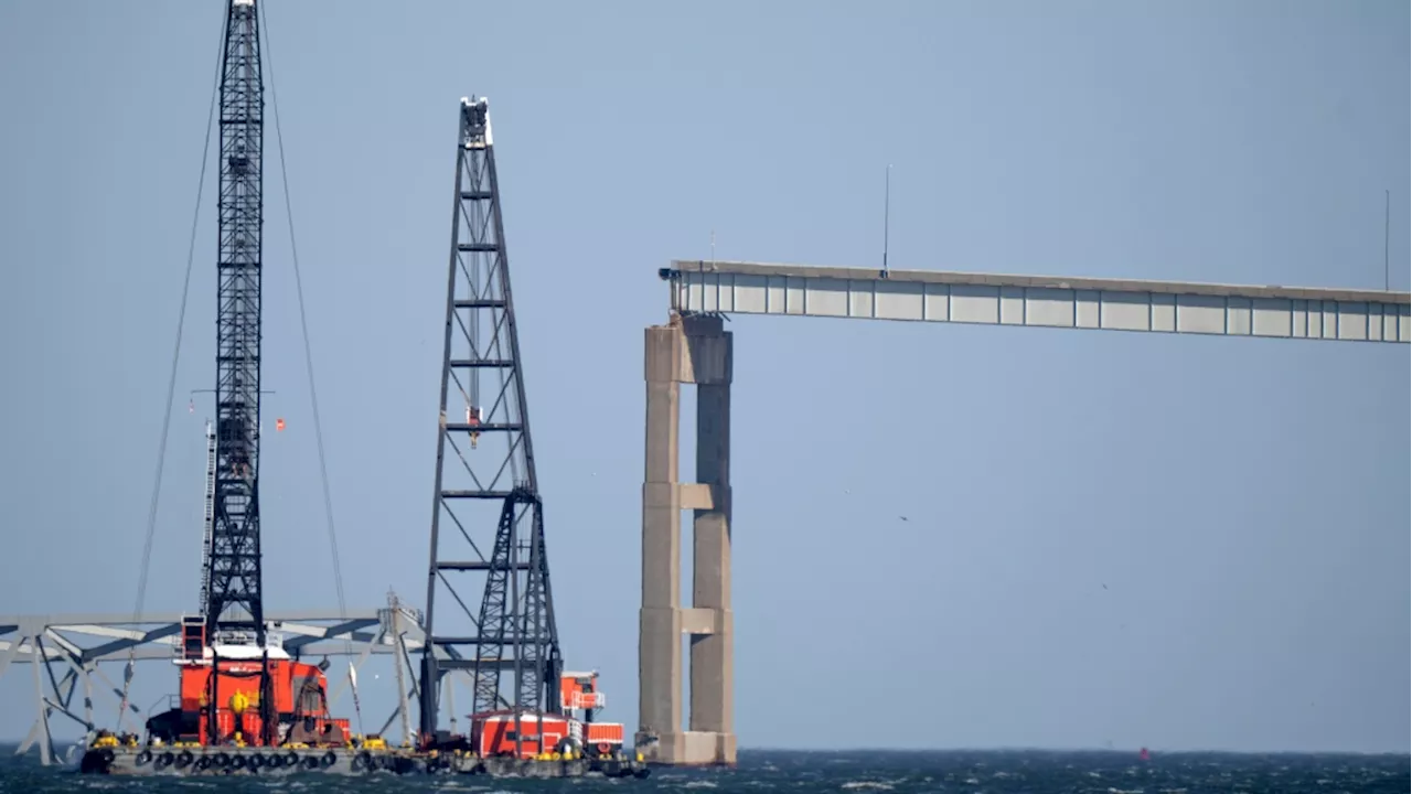 Crews carefully start removing first piece of twisted steel from collapsed Baltimore bridge