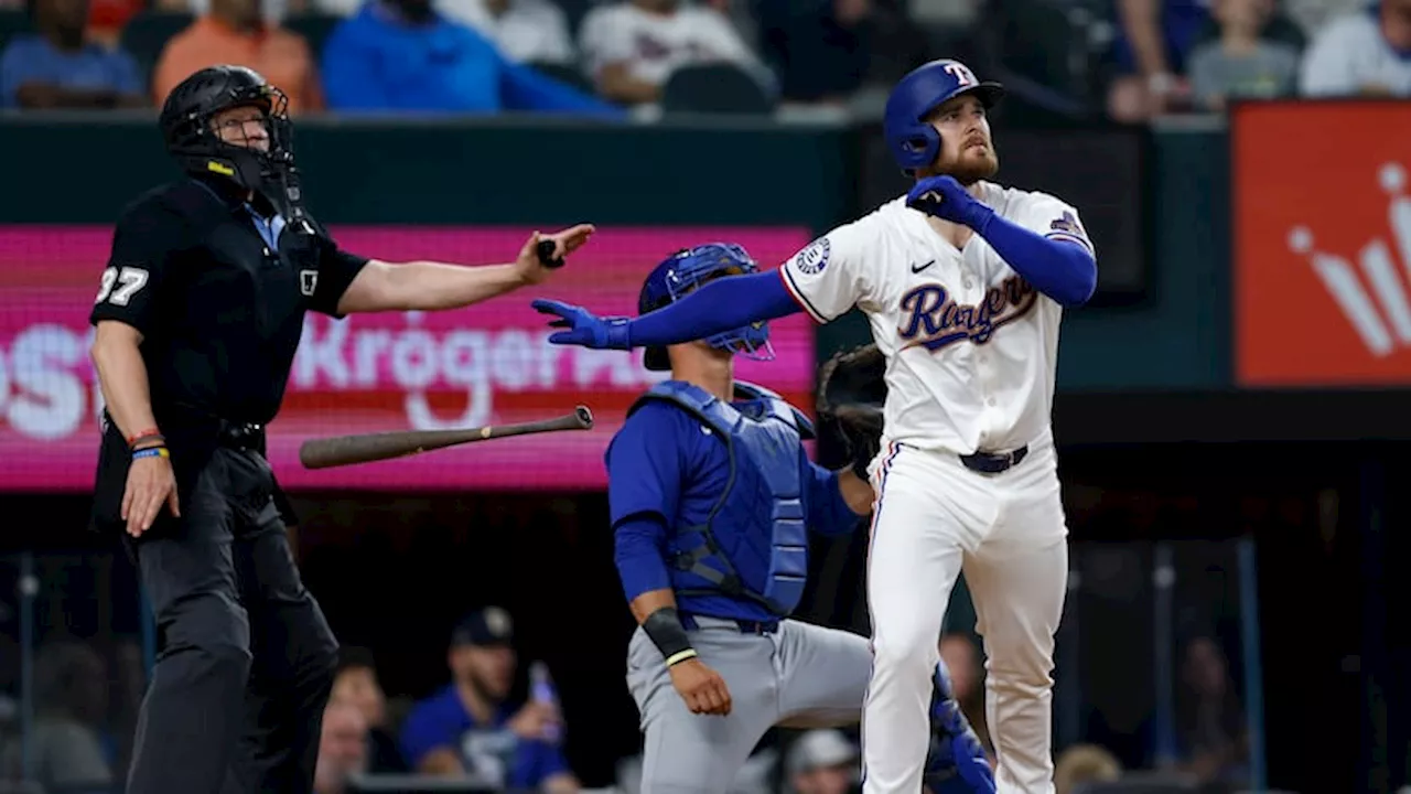 Jared Walsh homers, doubles in Rangers debut