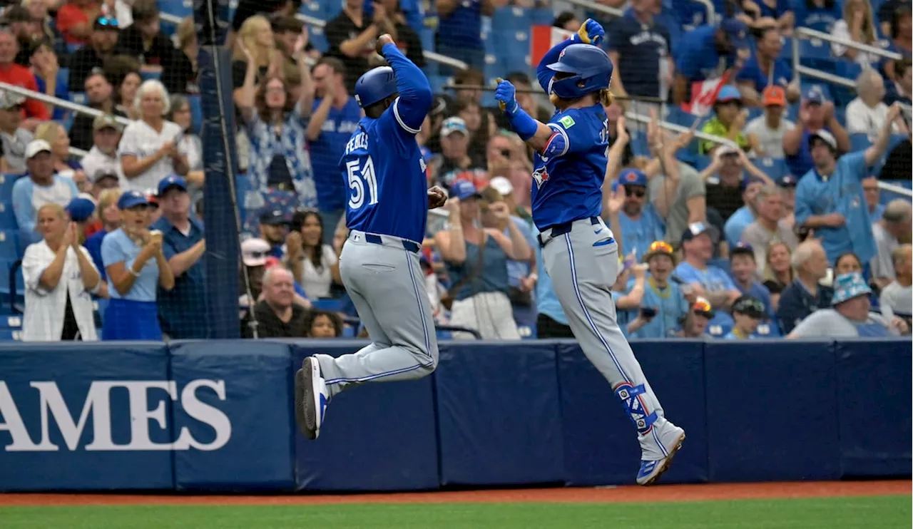 Justin Turner homers and drives in four runs as Blue Jays split four-game series by beating Rays 9-2