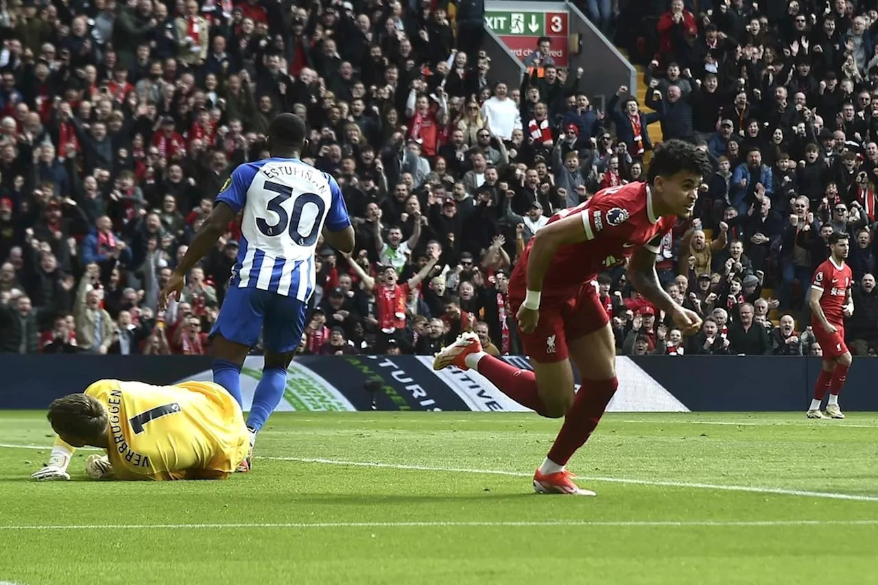 Salah fires title-chasing Liverpool to top of Premier League with 2-1 win over Brighton